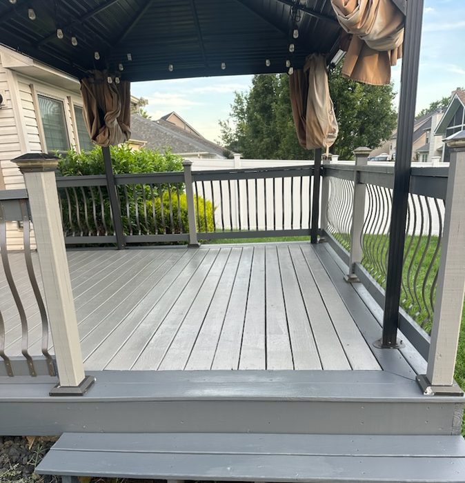 Gazebo deck and steps finished in a gray solid stain